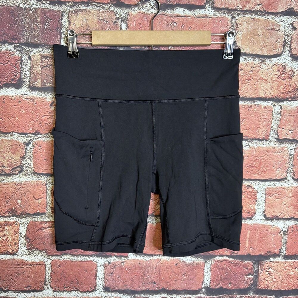 ATHLETA All In Shorts Black Bike Stash Pocket Zip Pocket Medium #211371-00